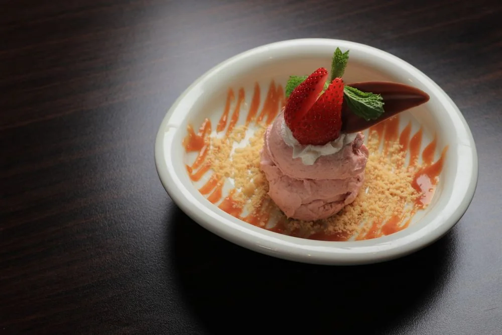 Fresh Scottish strawberries paired with clotted sweet cream ice cream