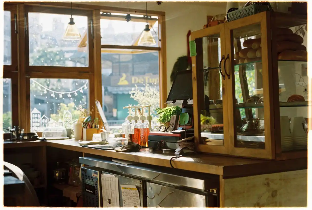 Warm wooden interiors and sunlit windows inside the Edinburgh café