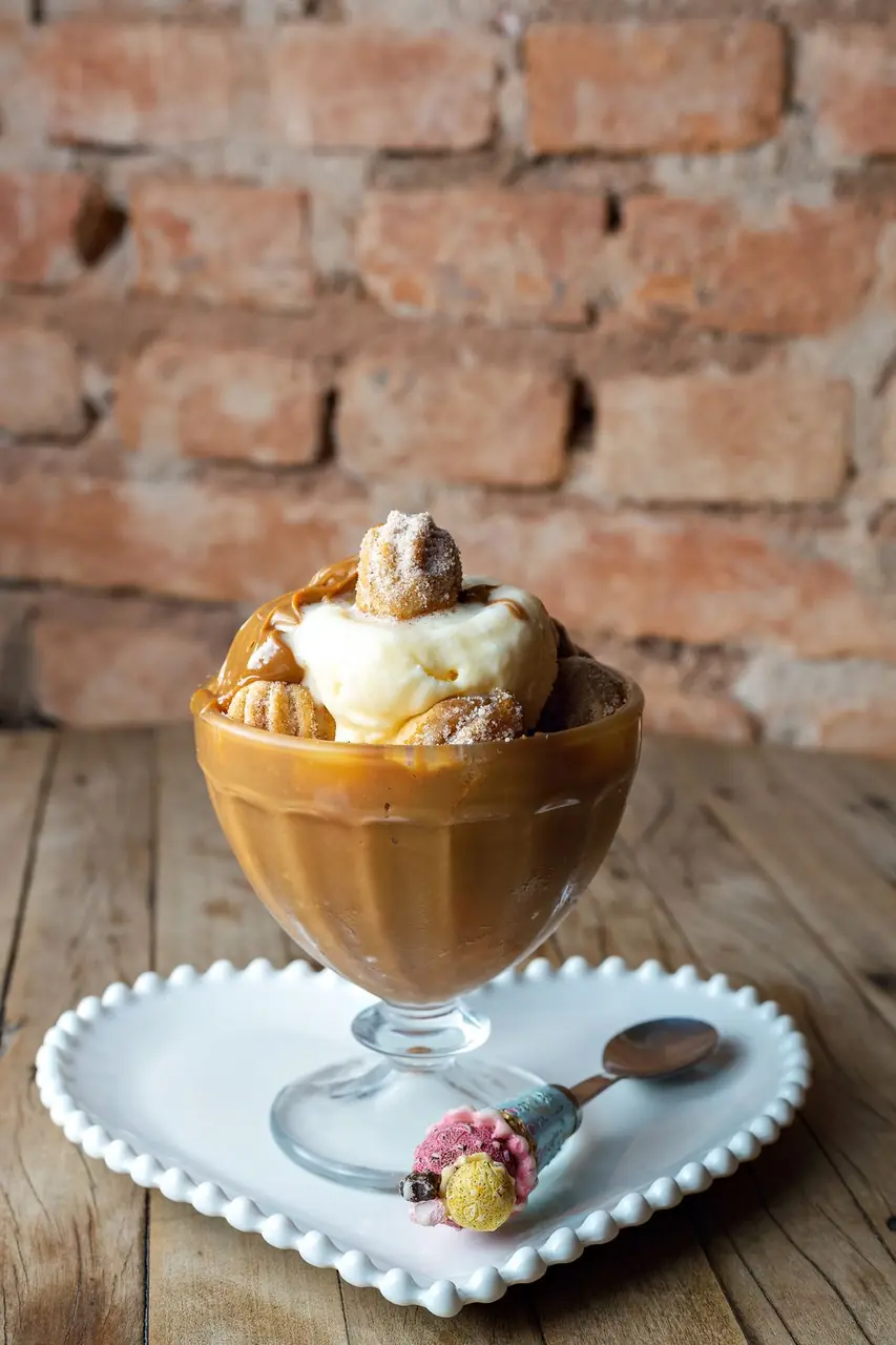 Golden crisp waffle paired with freshly churned salted caramel ice cream